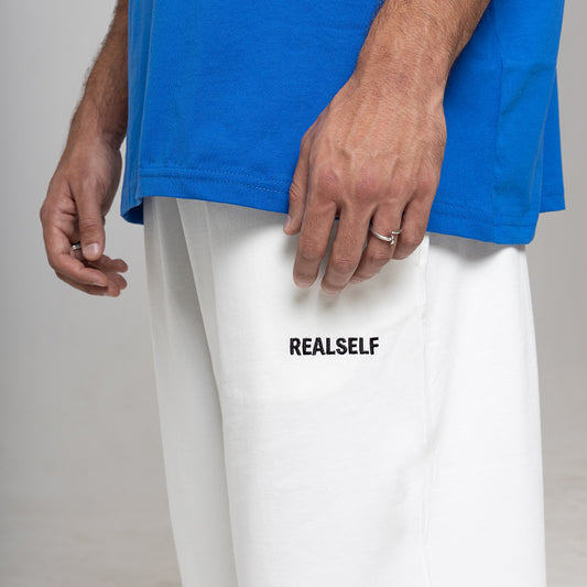 REALSELF EMBROIDERY LOGO WIDE LEG JOGGING PANTS