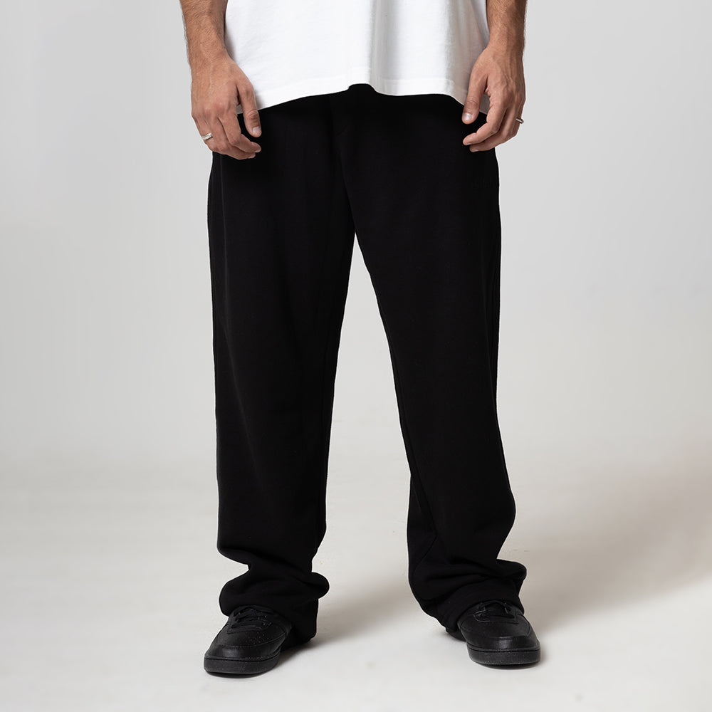 REALSELF EMBROIDERY LOGO WIDE LEG BLACK JOGGING PANTS