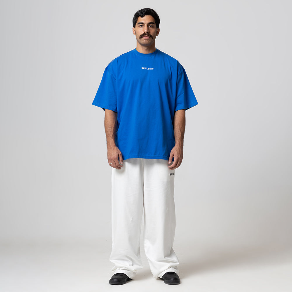 REALSELF EMBROIDERY LOGO WIDE LEG JOGGING PANTS